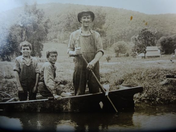 My dad Andrew with his brother and a young hired man having fun in the creek